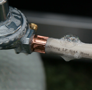 Soap & water propane cylinder safety leak test.